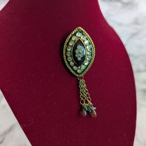 Elegant Gold Brooch Pendant with Chain Tassel